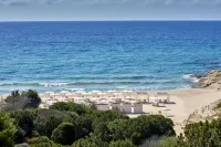 Baia Chia Laguna Resort, Curio Collection by Hilton Hotels in Chia