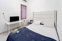 RedLiving Apartemen Eco Home - Wieg's Room Tower B Yashinoki Hotels near Pemancingan Harian Ikan Mas & Bawal Irfan