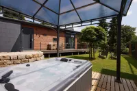 Gemütliches 4 Ferienhaus mit Whirlpool, Fitness, Infrarotsauna, Ebike, Alpakas