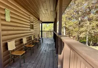 Beautiful cabin with fireplace and wrap around porch and private upstair balcony