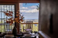 Views, Hot Tub, Skee-ball, Pool Table, Disc-golf, Trail Access on Property!