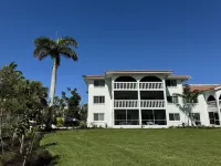 End unit with extra windows. Steps to the beach, private beach access!