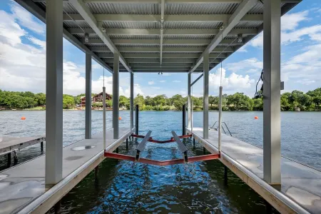Luxury Lake House w/2 story dock, boat lift, & private heated pool!
