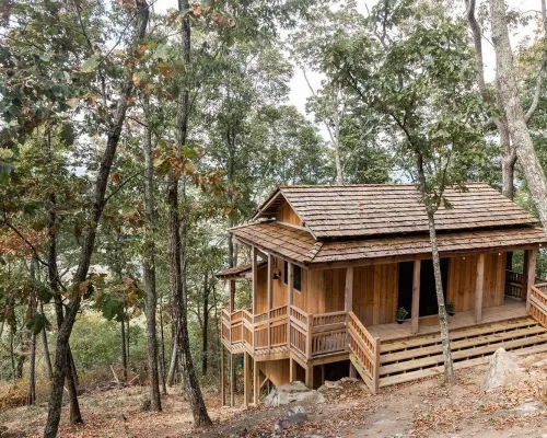 Japanese timberframe tiny house perched on side of Lookout Mountain Hotels in Dade County