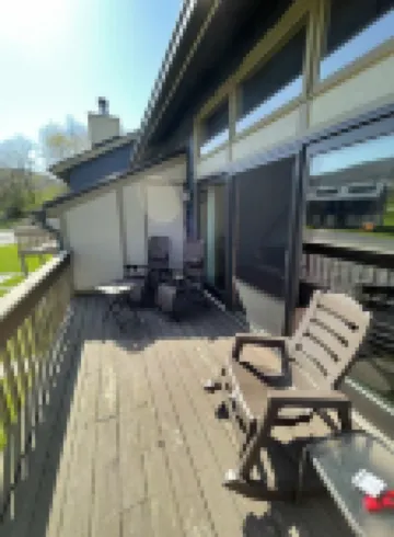 Updated townouse across from Holiday Valley - walk to ski lifts, pool and golf .