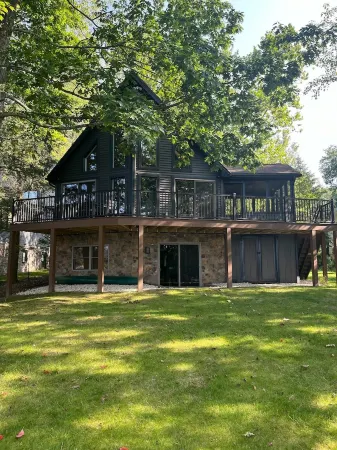 Spend Time Making Cherished Memories at This Gorgeous 5-Bedroom Lakefront Lodge!
