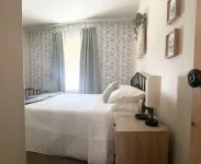 JSW Away Stay featuring 1 King size bed, 2 queen size beds, and 2 baths
