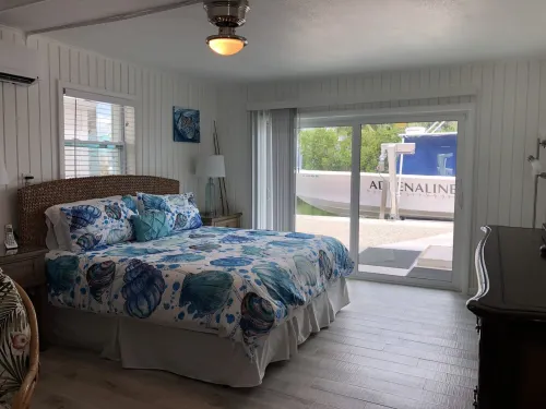 Coconut Sunsets Open Water Views, Ice, Pool, Spa 100 ft dockage, Putting Green