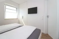 Comfortable apartment on the upper floor for 4 people with balcony, garden & terrace.