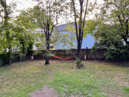 Inviting Porch and Spacious Deck with Fenced Backyard - Charming Haven
