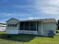 Serene Golf Course Views and Inviting Indoor-Outdoor Living - Charming Retreat