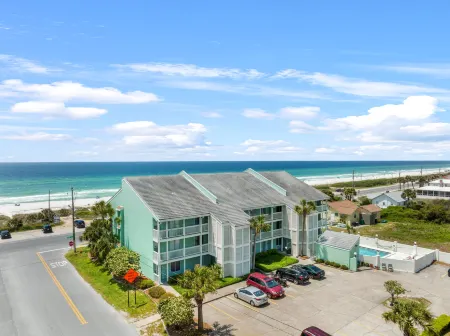 Scenic Balcony and Gated Pool Access - Breathtaking Coastal Haven
