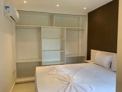 Hosts Br - Apartamentos Funcionais Hoteles cerca de Ohana Garden