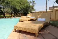 The Capital Guest House - piscina