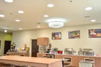 誇烏特莫克坎波門諾温德姆麥客達套房酒店 - 早餐