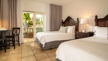 Lazy Parrot Inn Отели в г. Пунтас