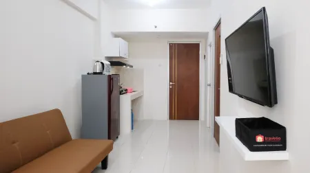 Clean and Comfy 2Br Apartment at Puncak Kertajaya Отели в г. Sukolilo