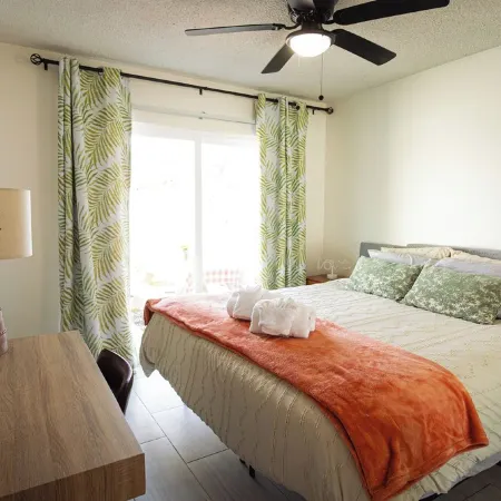 Steps to Beach & Shops - King Suite - Private Patio & Grill + Parking