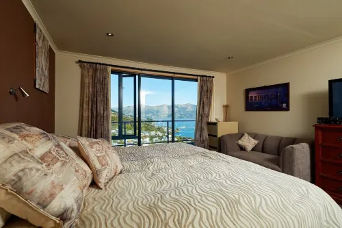 Akaroa Holiday Home.  Spacious, sunny, harbour views and close to town. Sleeps 8