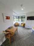 Cozy private studio nestled amongst the Rainforest. Café and amenities onsite.