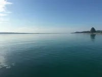 Torch Lake Village Cozy Cottage with private dock