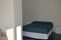 Lavender studio apartment, nestled in the sand dunes, 20m from the beach.