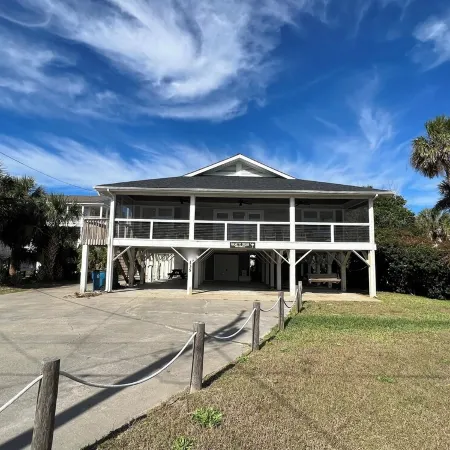 Palmetto Dream is a 4-bedroom 2.5 bath house located on 2nd Row with Great Views