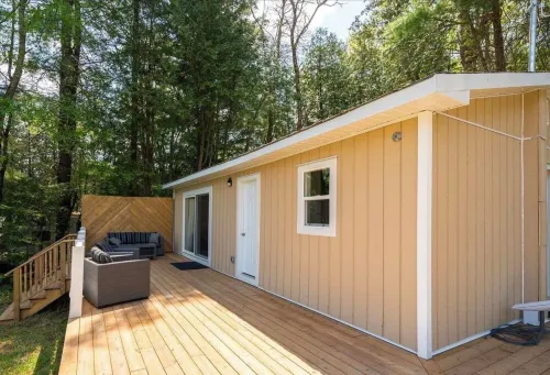 2 lakefront cottages on Shadow Lake with dock and water toys
