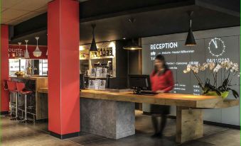 Ibis Saint-Genis-Pouilly Genève - Housity