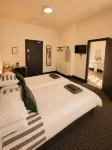Inviting a Double Room for Business or Leisure - Holiday Apartments