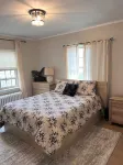 Walk to the Waves: Tudor Living Blocks from the Lake & Zoo