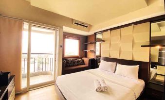 Warm and Comfort Studio Apartment at Braga City Walk