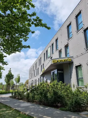 Grimm’s Berlin-Potsdam Отели в г. Клайнмахнов