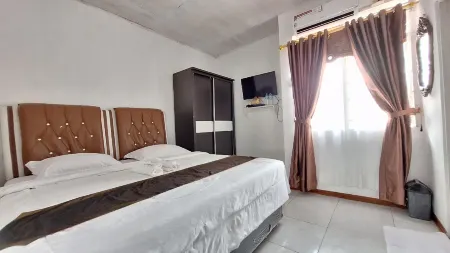 Harisha Homestay Sawah Lunto Syariah Redpartner Отели рядом с достопримечательностью «NUSA INDAH playkids»