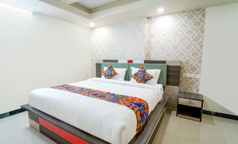Fabhotel Grand Castle - Housity