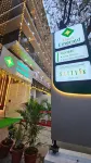 Emerald Urban Comforts Hotels near Chamarajendra Academy of Visual Arts