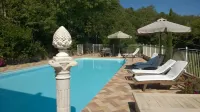 Large and very well furnished apartment in a villa, with garden and pool. D.