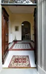 Historic house with garden in front of the Grotta Giusti Thermal pool near Lucca