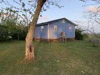 Watch the sun rise from this waterfront home.