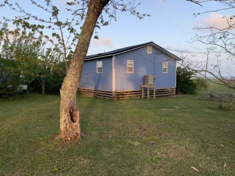 Watch the sun rise from this waterfront home.