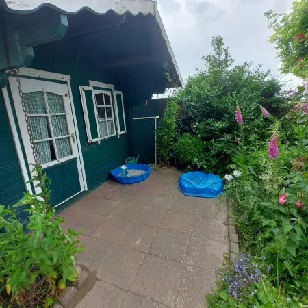 Gemütliche Erdgeschosswohnung mit Terrasse Отели в г. Вестердайхштрих