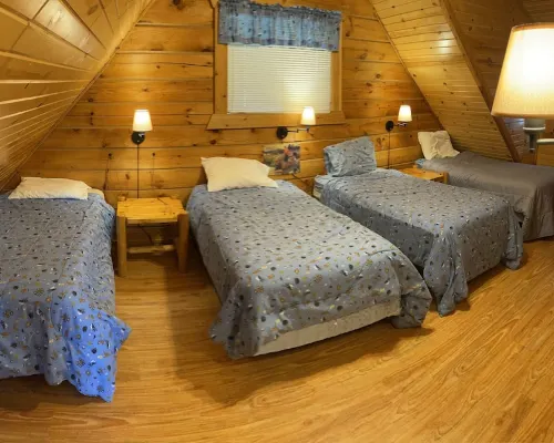 Entertainment Cabin: with 8 Large Screen TV's on 1 Wall.  Great for Small Groups Hotels in Warrens