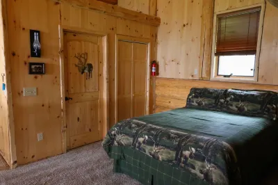 Unique Alaskan log home in trees & wild flowers on 14-acre private homestead.