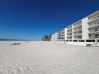 The beach is your backyard! Family size condo on Indian Shores! Sleeps 10!