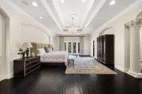 Gated Waterfront Luxury Home! Private Pool, Hot Tub & Mansion Views!