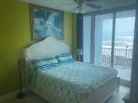 ~Feel as if you were sitting on Beach , Front door Parking, High Demand Unit !~