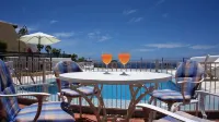 Luxury villa with private heated pool in private garden. Close to beaches.
