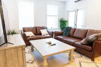 Cozy Downtown Loft: 2BR condo w/ AC, WiFi, Balcony & Free 2-car parking.