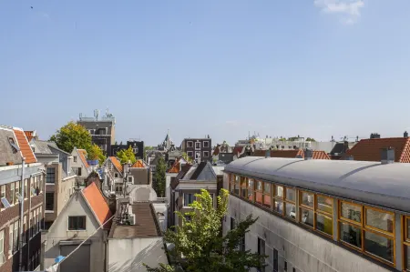 Kuwadro Guesthouse Centrum Отели рядом с достопримечательностью «Мост Питон»