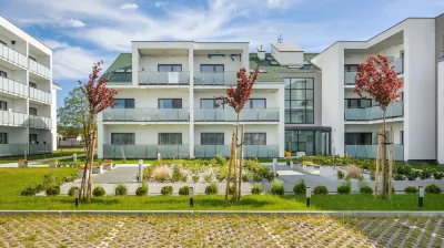 Apartamenty Sun & Snow Sunset Resort فنادق في Grzybowo